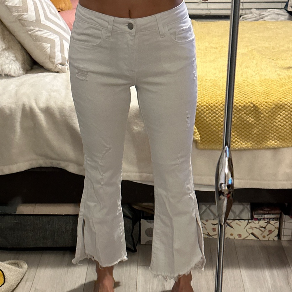 White flared and cropped flying monkey jeans